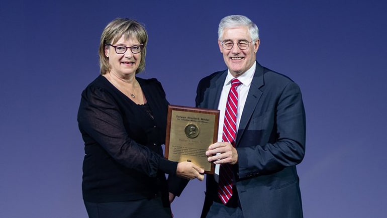 Phillips Baker receiving an award