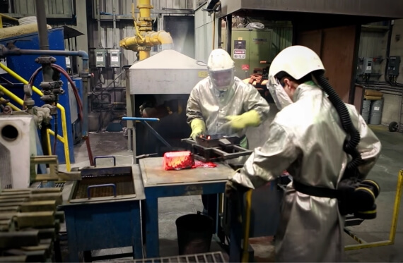 Two workers working in a lab.