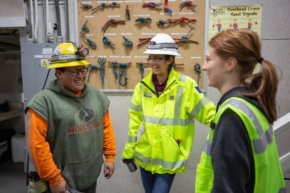 An image of workers laughing.