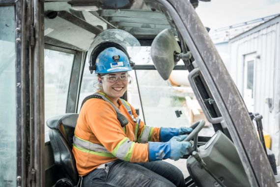An image of a Hecla employee in a vehicle.