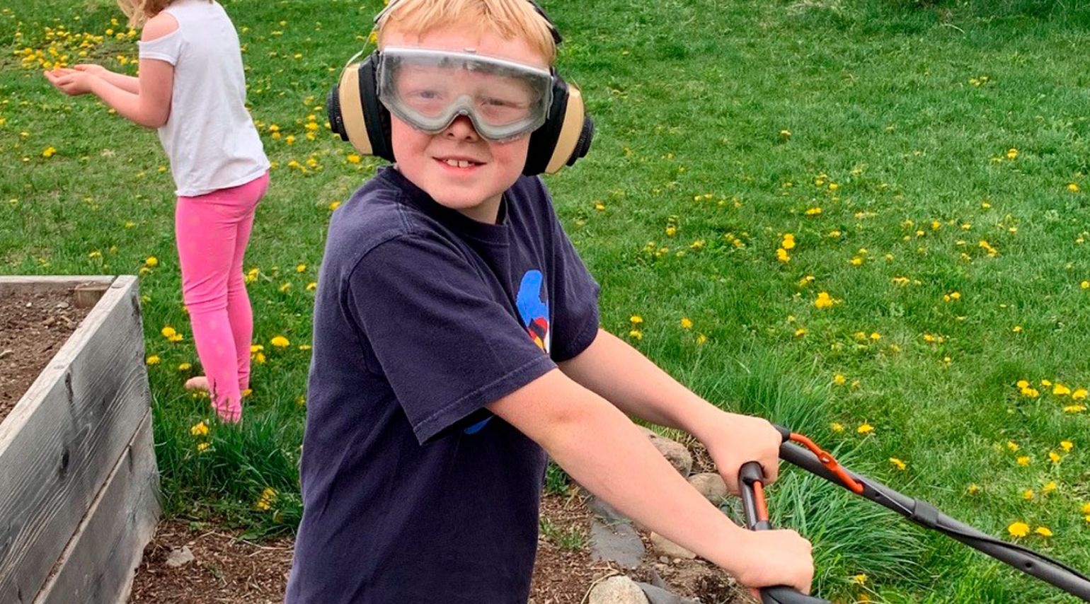 A graphic of a kid with safety goggles.