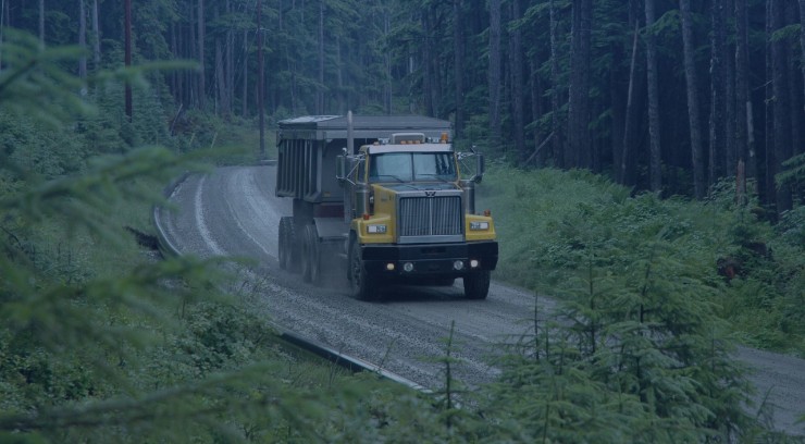 A truck driving through greek mine