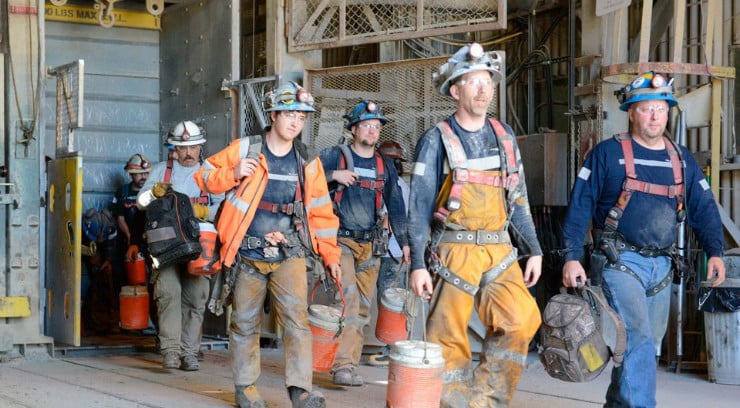 A group of construction workers walking.