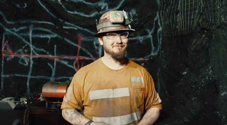 A photo of a Hecla worker smiling.