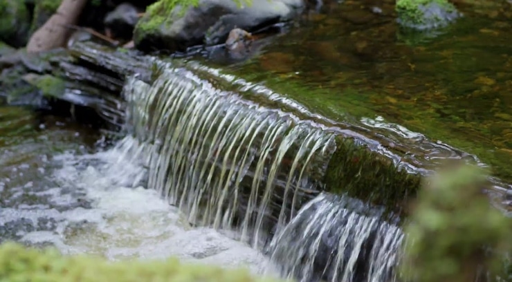 A graphic of water flowing.